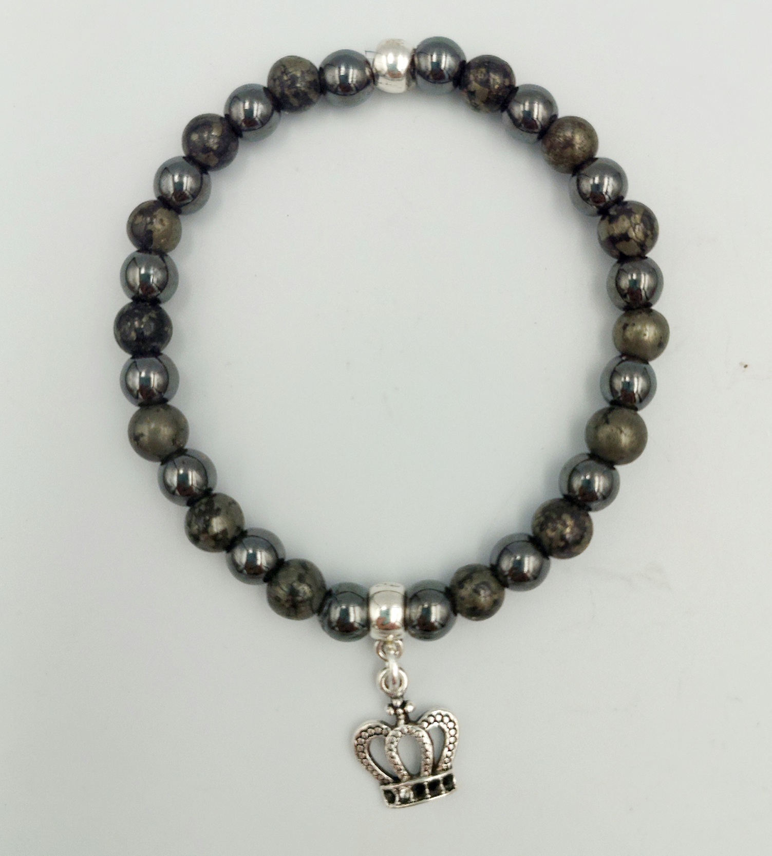 Pyrite and Hematite bracelet with 6mm beads and a crown charm