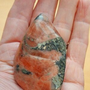 Deep Salmon pink Triplite, Pyrite and Wagnerite Tumblestone
